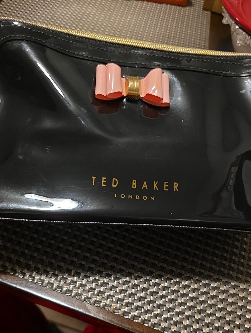 Ted Baker Black Patent Cosmetic Bag with Pink Bow Accent